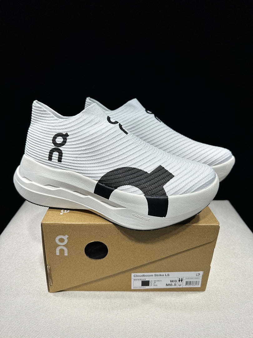On Cloudboom Strike LS Running Shoes in White Black - product image from the listing.