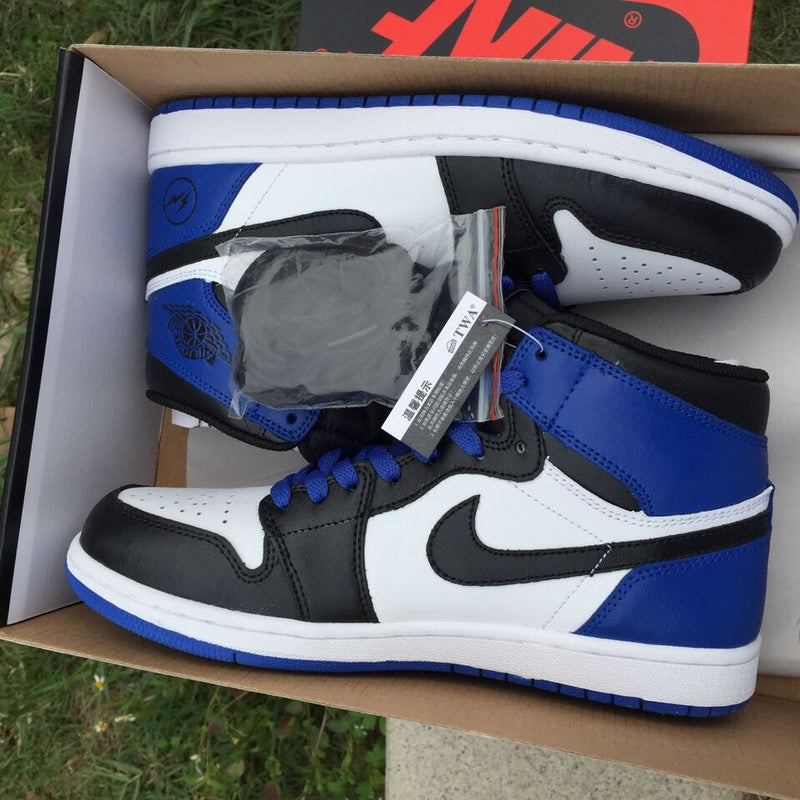 Jordan 1 High Sneakers in Black, in White and Royal Blue - product image from the listing.
