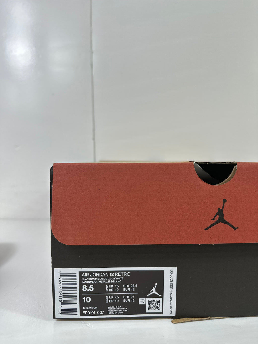 Air Jordan 12 Phantom White Metallic Gold Sneakers FD9101-007 - product image from the listing.