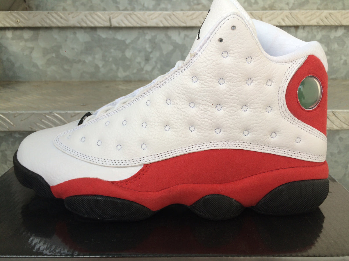 Air Jordan 13 Sneakers in White Red Black - product image from the listing.