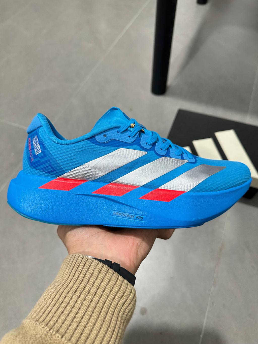 Adidas Lightstrike Pro JR2023 Running Shoes in Blue Red - product image from the listing.