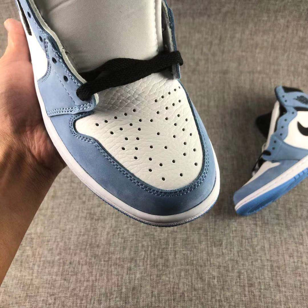 Air Jordan 1 High OG University Blue Sneakers - product image from the listing.