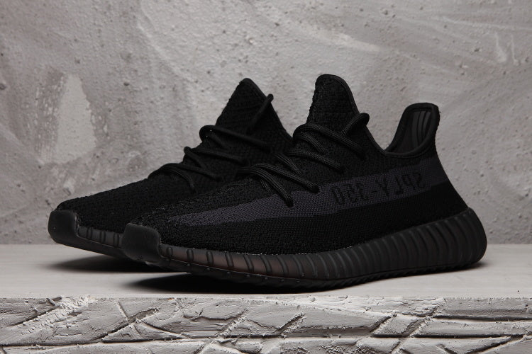 Yeezy 350 V2 Low-Top Sneakers in Black - product image from the listing.