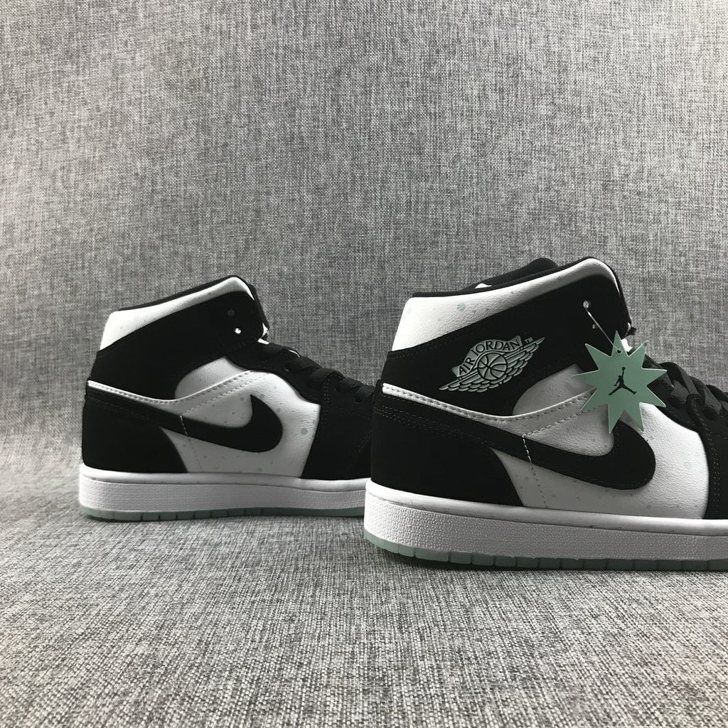 Air Jordan 1 Mid Sneakers in Black White Mint BQ6931-103 - product image from the listing.