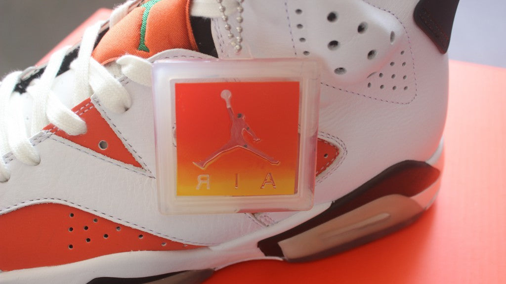 Air Jordan 6 Gatorade Basketball Sneakers in White Orange - product image from the listing.