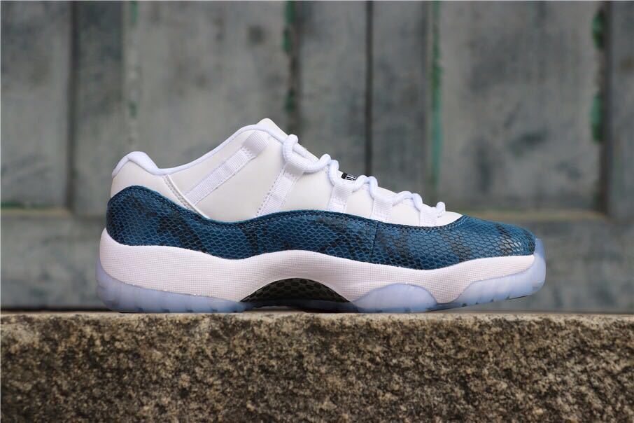 Navy Snakeskin Sneakers - Air Jordan 11 Low - product image from the listing.