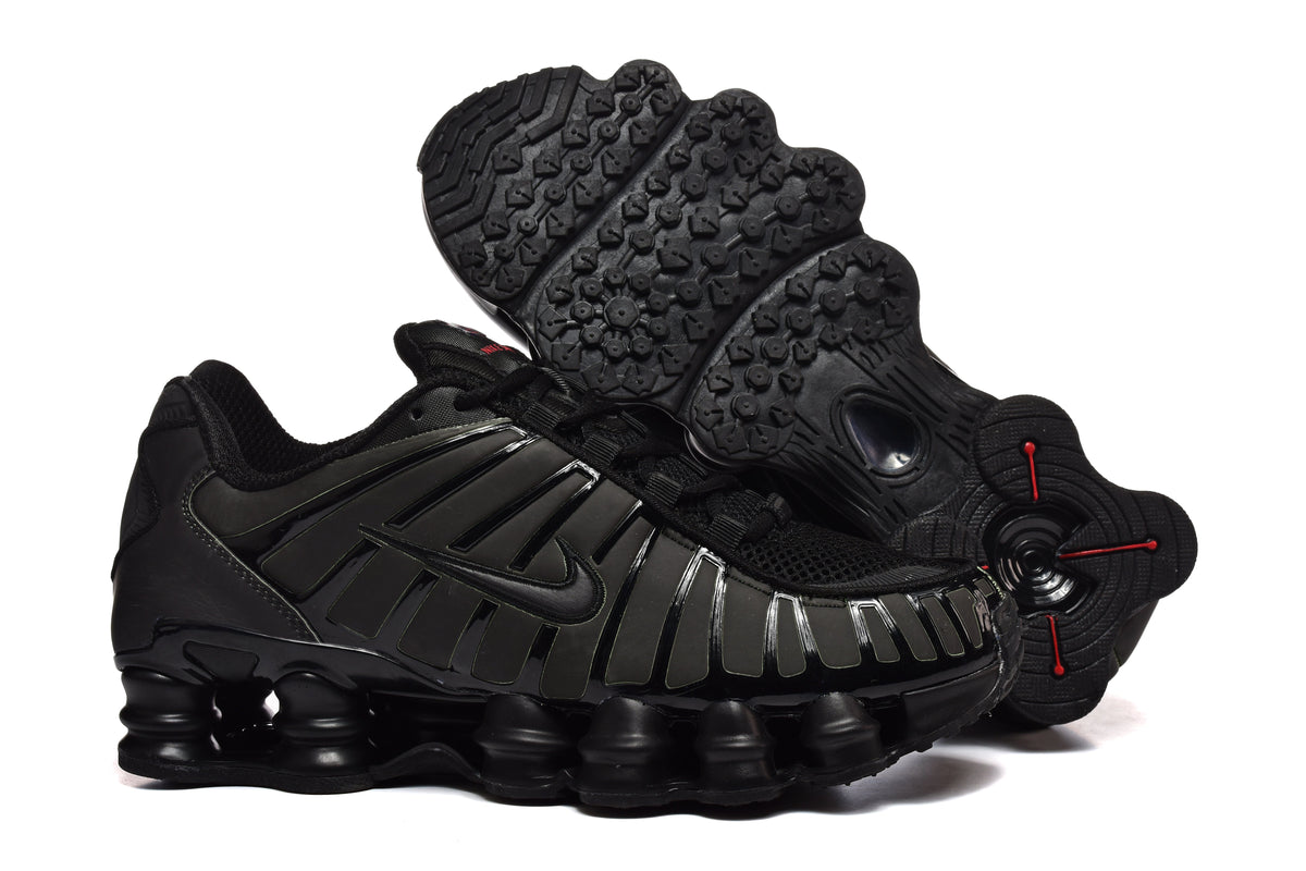 Black and Pink Nike Shox TL Sneakers - product image from the listing.