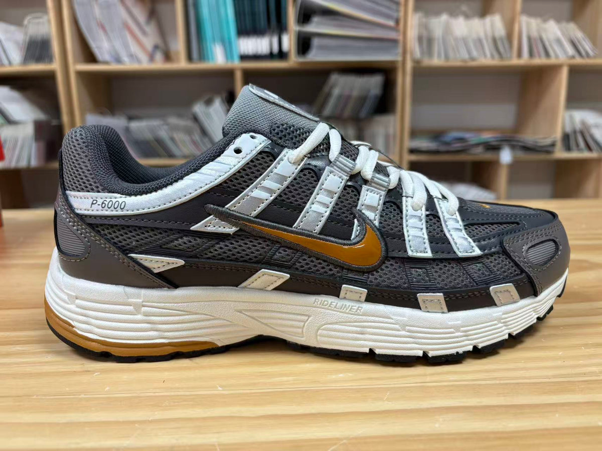 Nike P-6000 Sneakers CD6404-204 in Charcoal and White - product image from the listing.