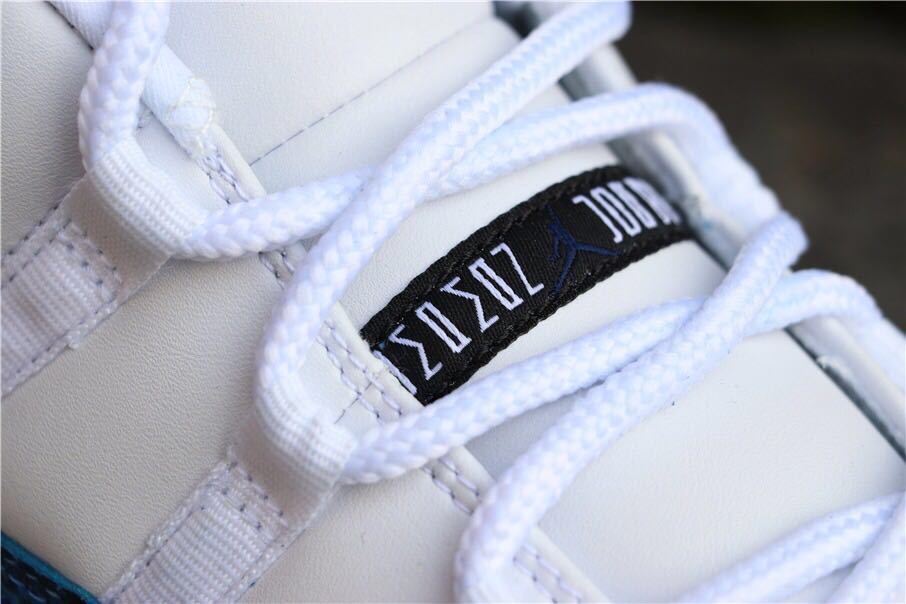 Navy Snakeskin Sneakers - Air Jordan 11 Low - product image from the listing.