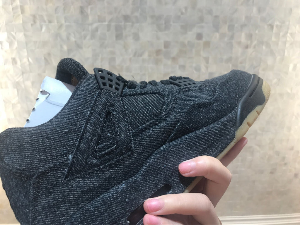 Jordan 4 Retro Levi's Sneakers in Black Denim A02571-001 - product image from the listing.
