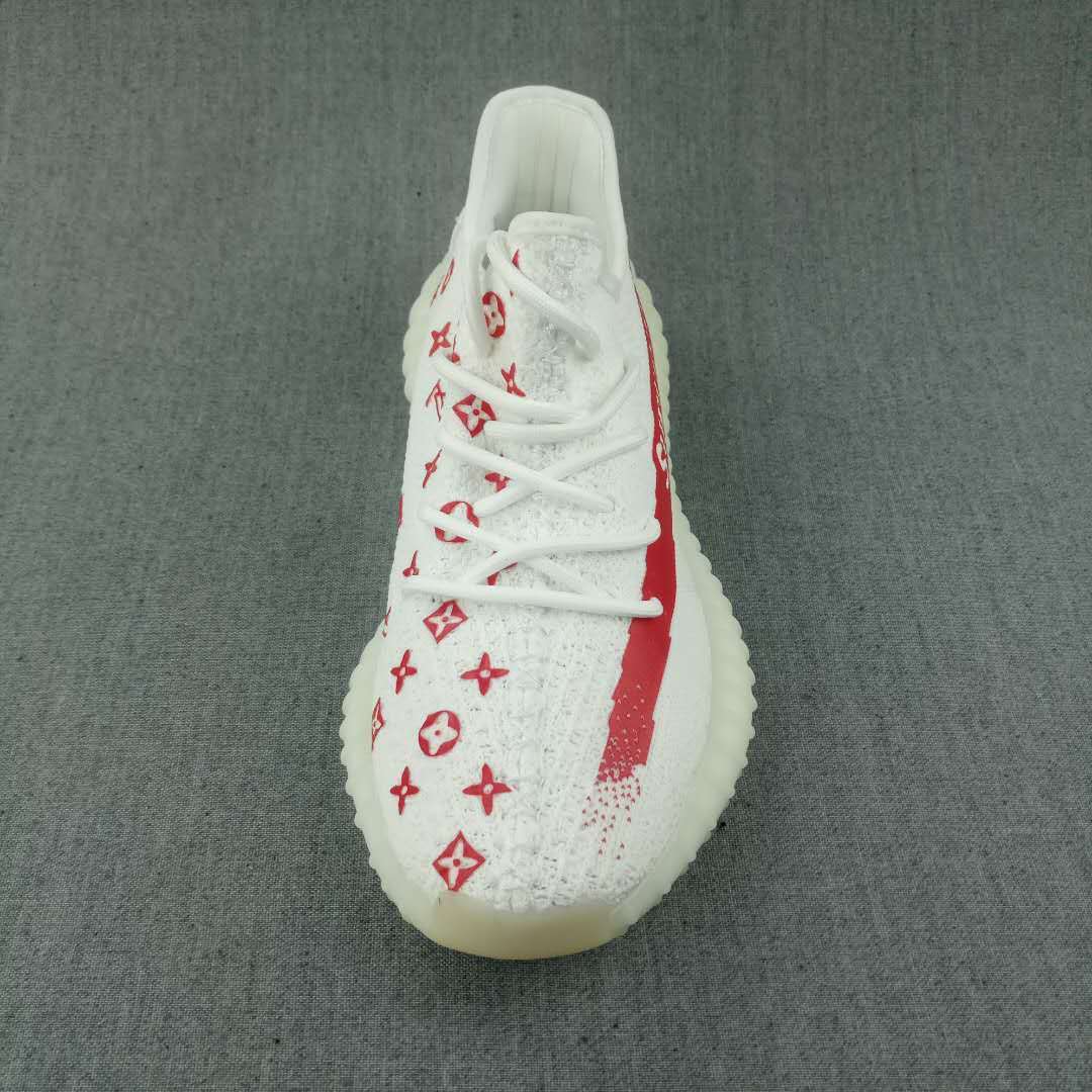 Yeezy 350 V2 Low-Top Sneakers in White and Red - product image from the listing.