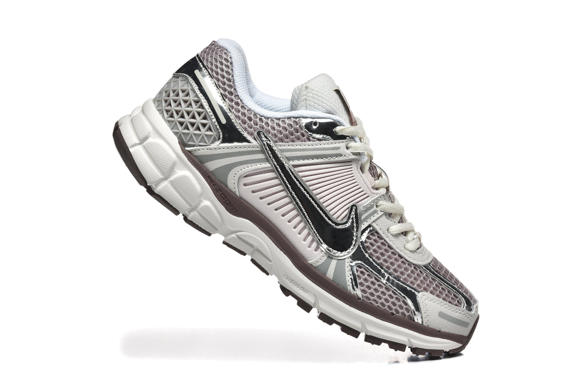 Nike Vomero 5 Trainers in Silver and Mauve - product image from the listing.