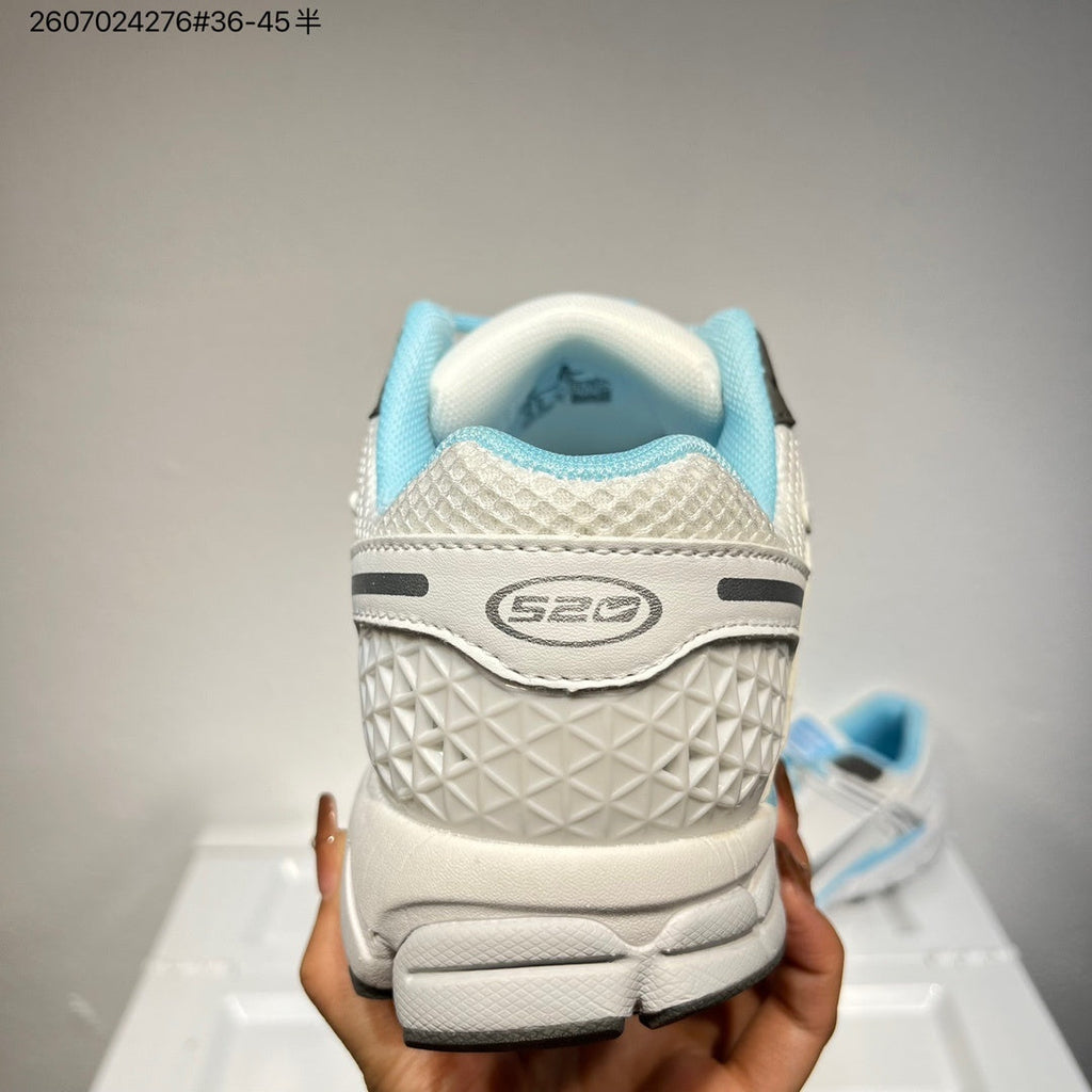 Nike Air Zoom Vomero 5 Sneakers in White and Blue - product image from the listing.