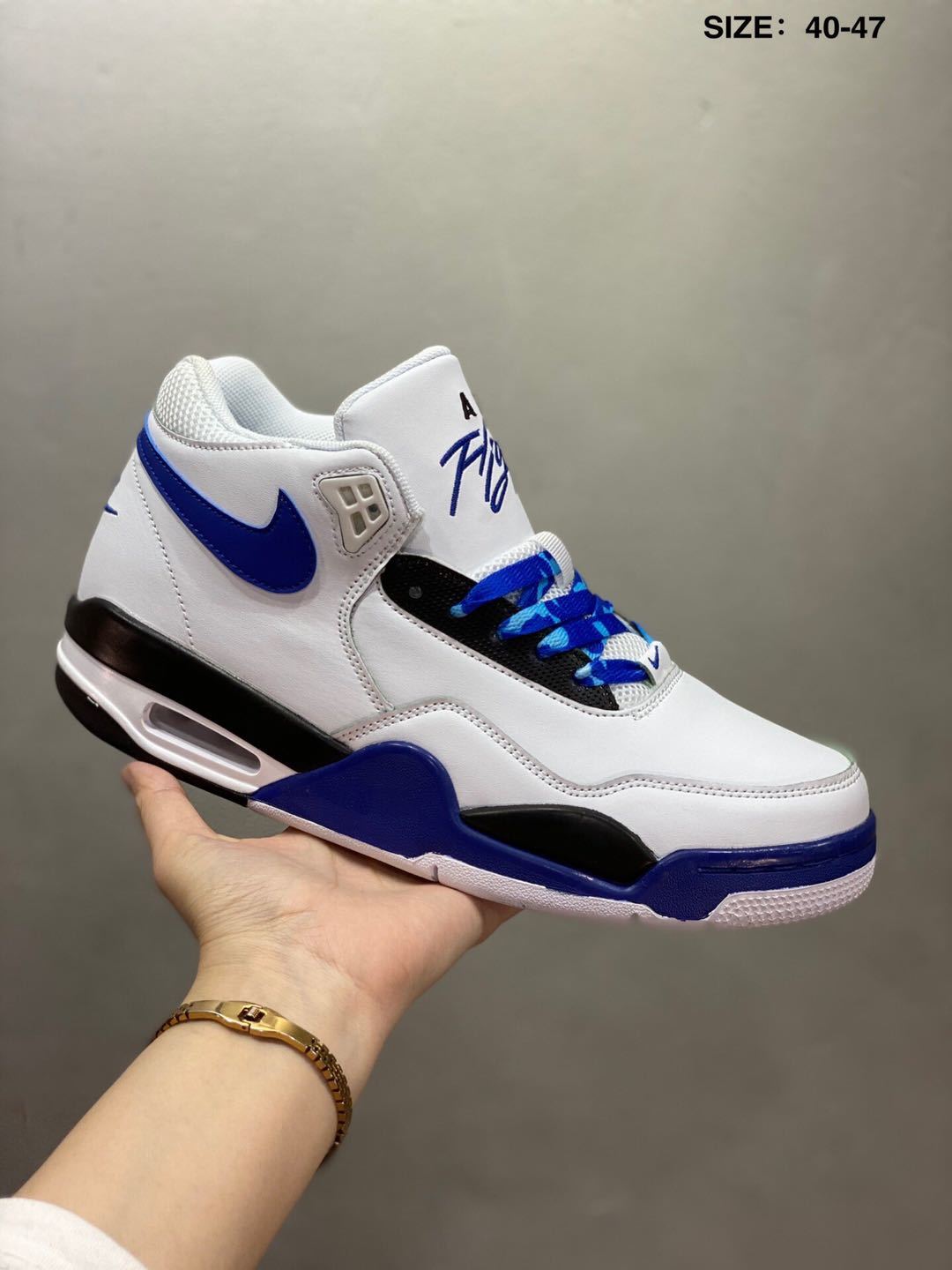 Nike Air Flight 89 Sneakers in White and Royal Blue - product image from the listing.