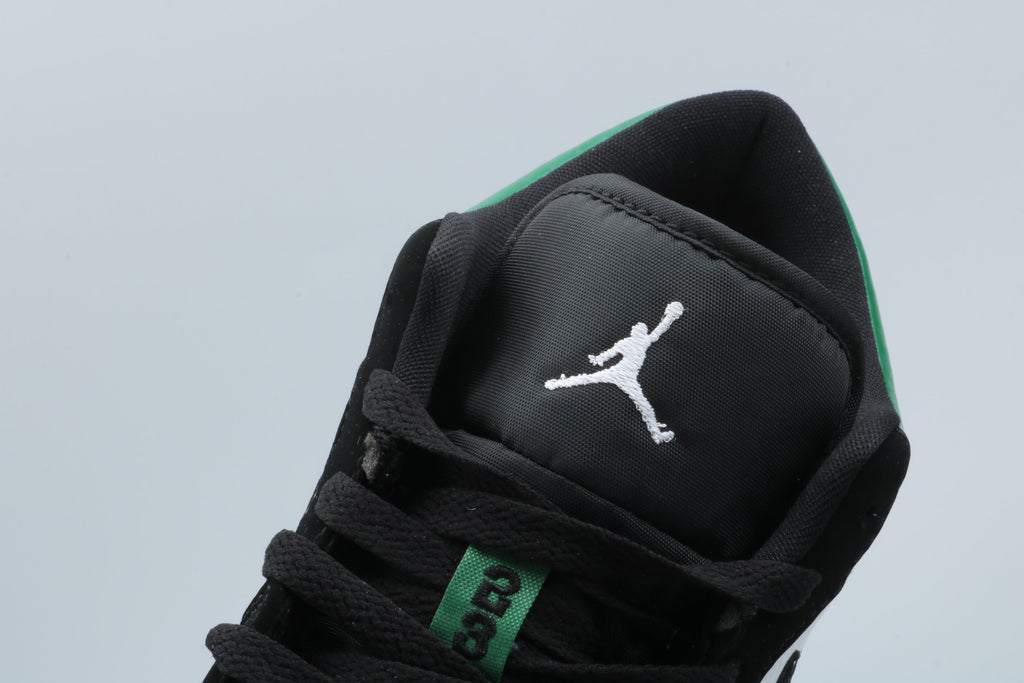 Jordan 1 Low Green Toe Sneakers in Black White Green - product image from the listing.