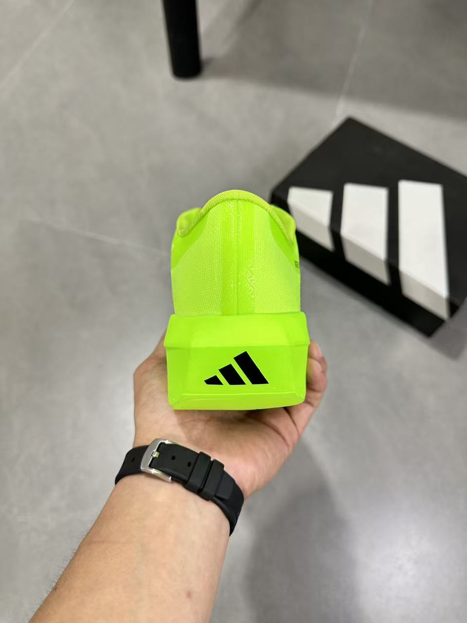 adidas Adizero Evo SL 2 Neon Running Shoes in Yellow - product image from the listing.