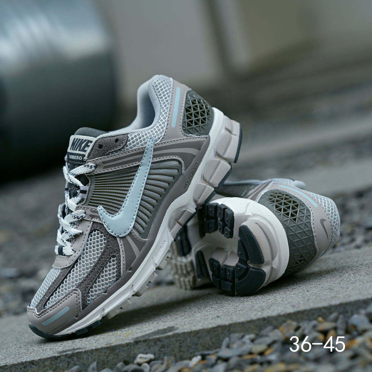 Grey Nike Air Zoom Vomero 5 Running Shoes - product image from the listing.