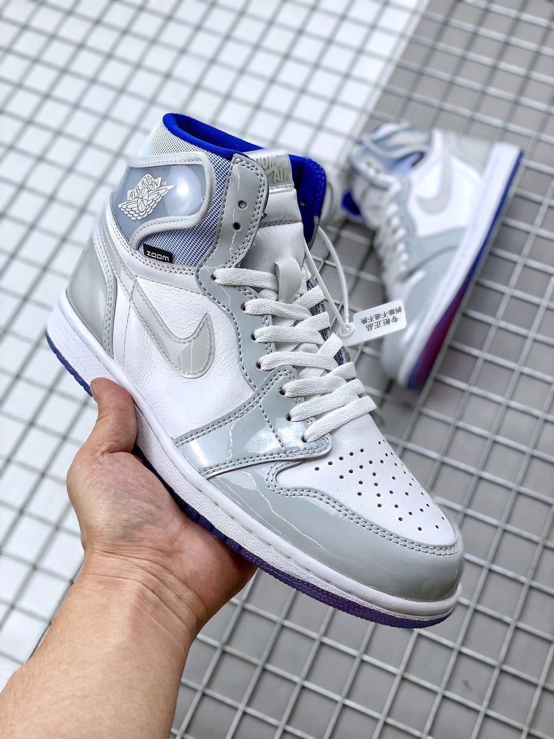 Air Jordan 1 High Zoom R2T Sneakers White Grey Blue - product image from the listing.