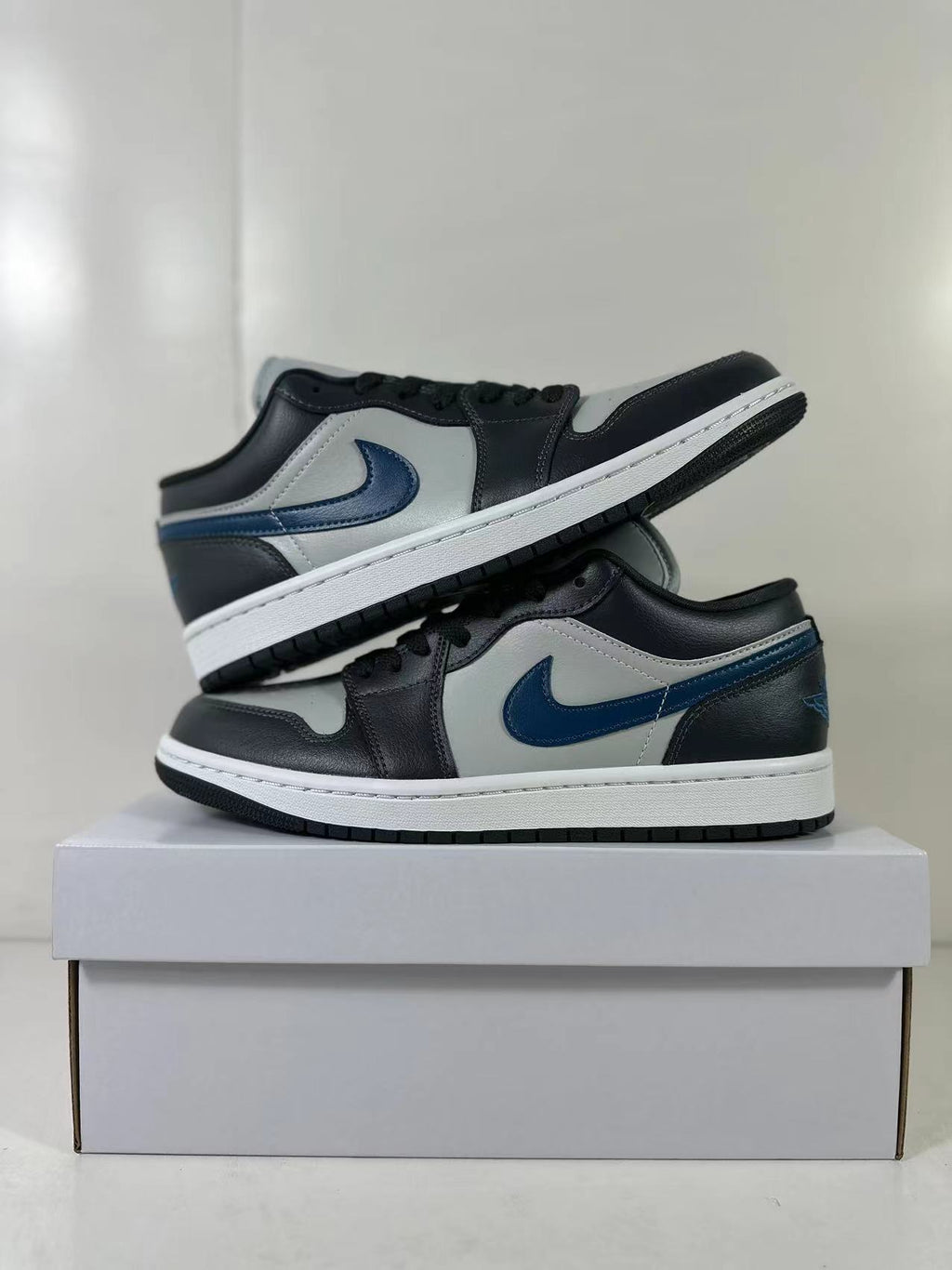 Air Jordan 1 Low Black Grey Blue DC0774-040 - product image from the listing.