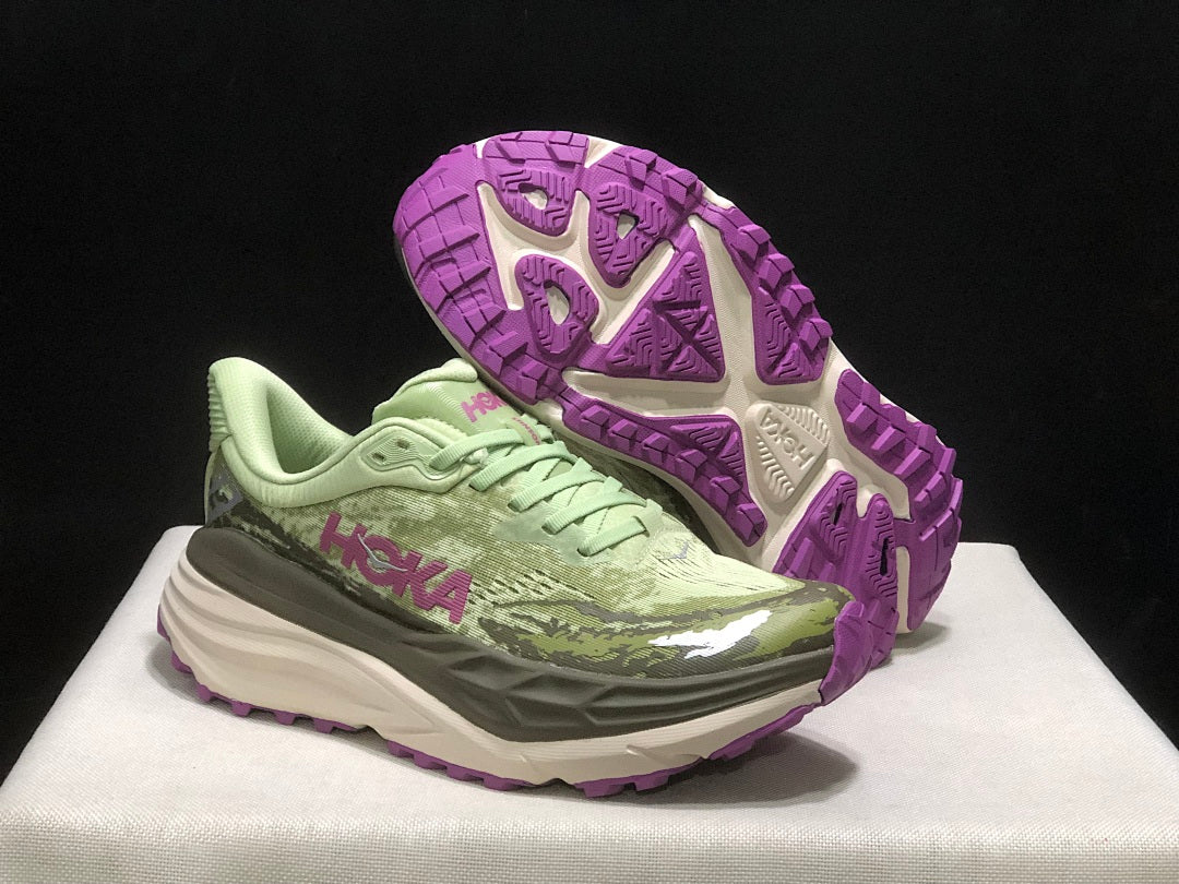 HOKA Stinson 7 Trail Running Shoes in Sage in Green - product image from the listing.