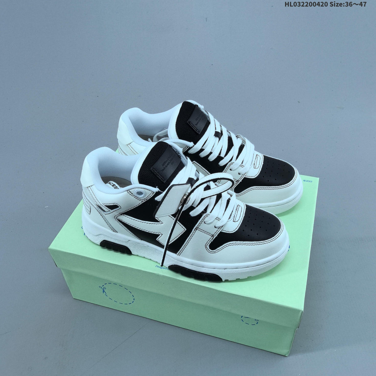 White and Black Off-White Arrows Low-Top Sneakers - product image from the listing.