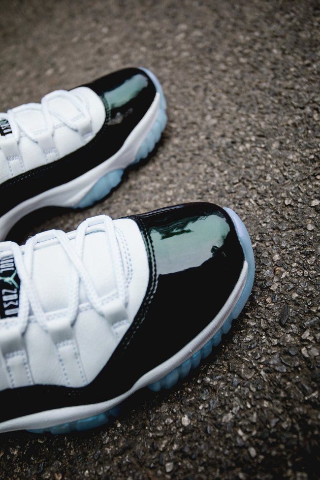 White and Black Air Jordan 11 Iridescent Sneakers - product image from the listing.