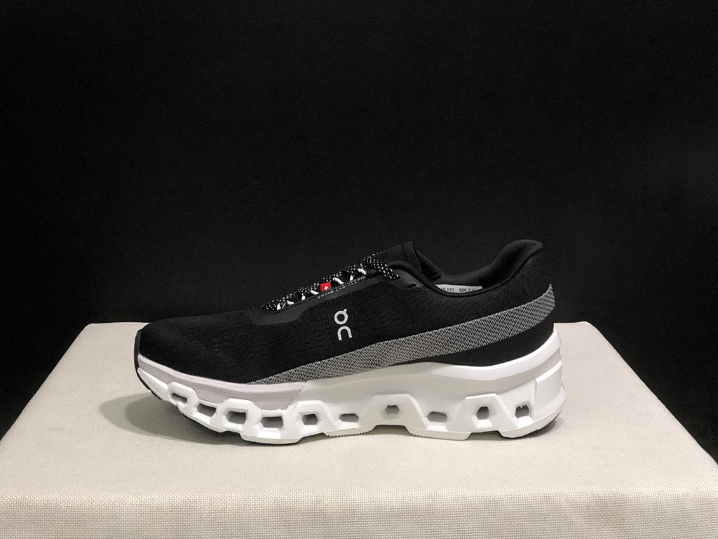 On Cloudmonster 2 Running Shoes in Black White - product image from the listing.