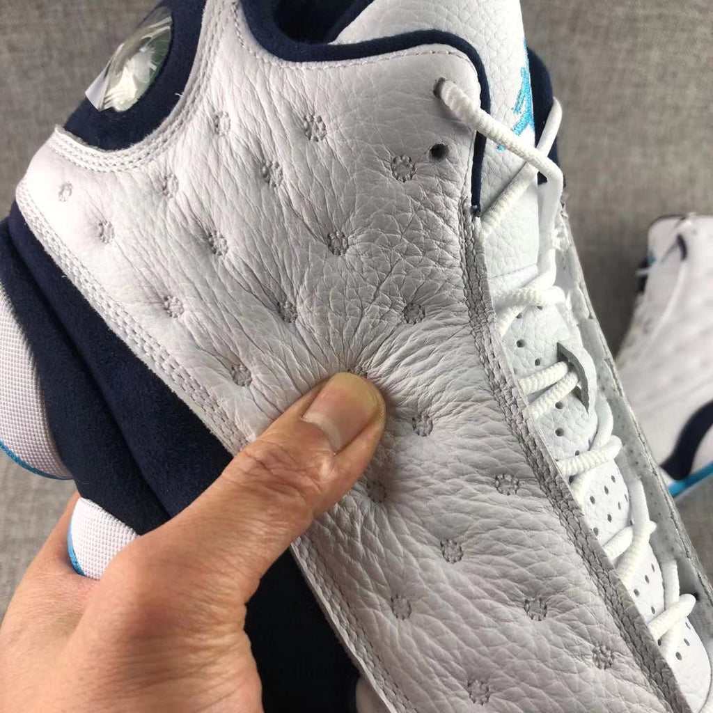 Air Jordan 13 Dark Powder Blue Sneakers White Navy - product image from the listing.