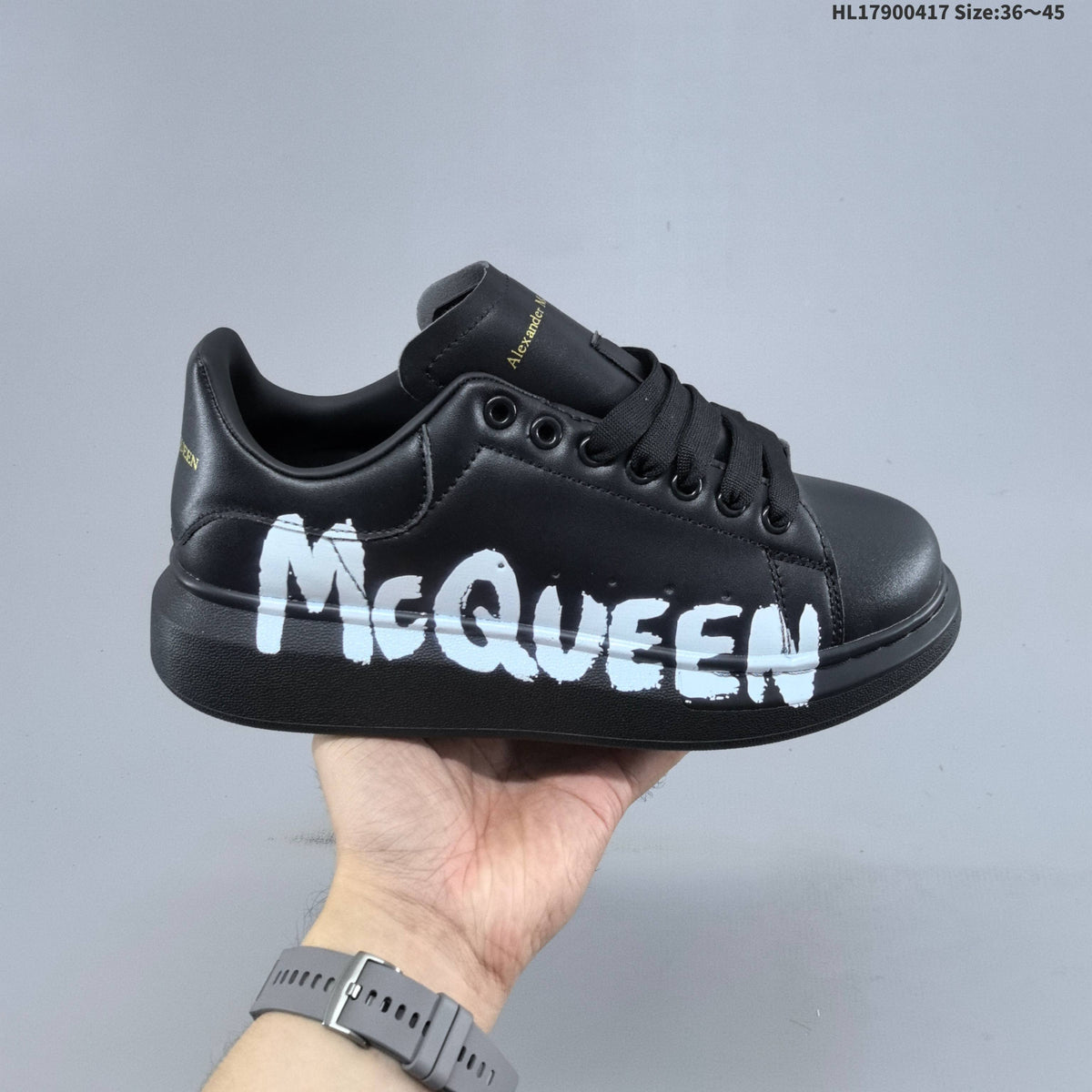 Alexander McQueen Oversized Low-Cut Sneakers with Logo - product image from the listing.