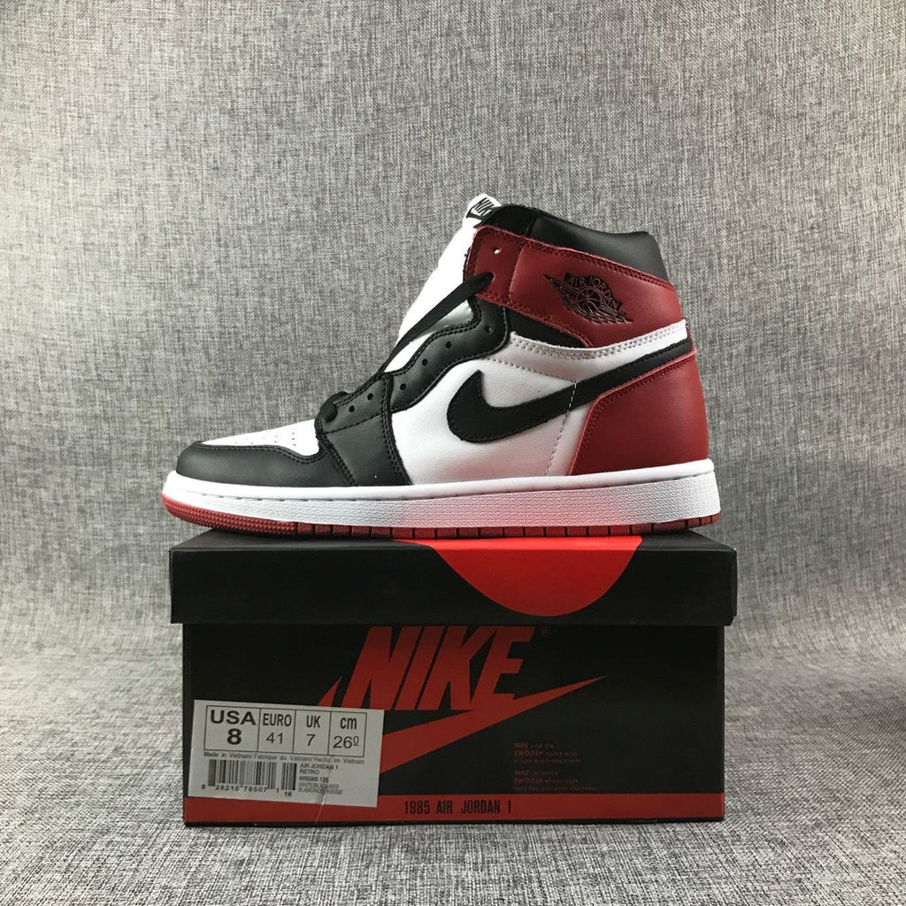 Black Toe Sneakers - Air Jordan 1 High 555088-184 - product image from the listing.
