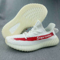 Yeezy 350 V2 Low-Top Sneakers in White and Red - product image from the listing.
