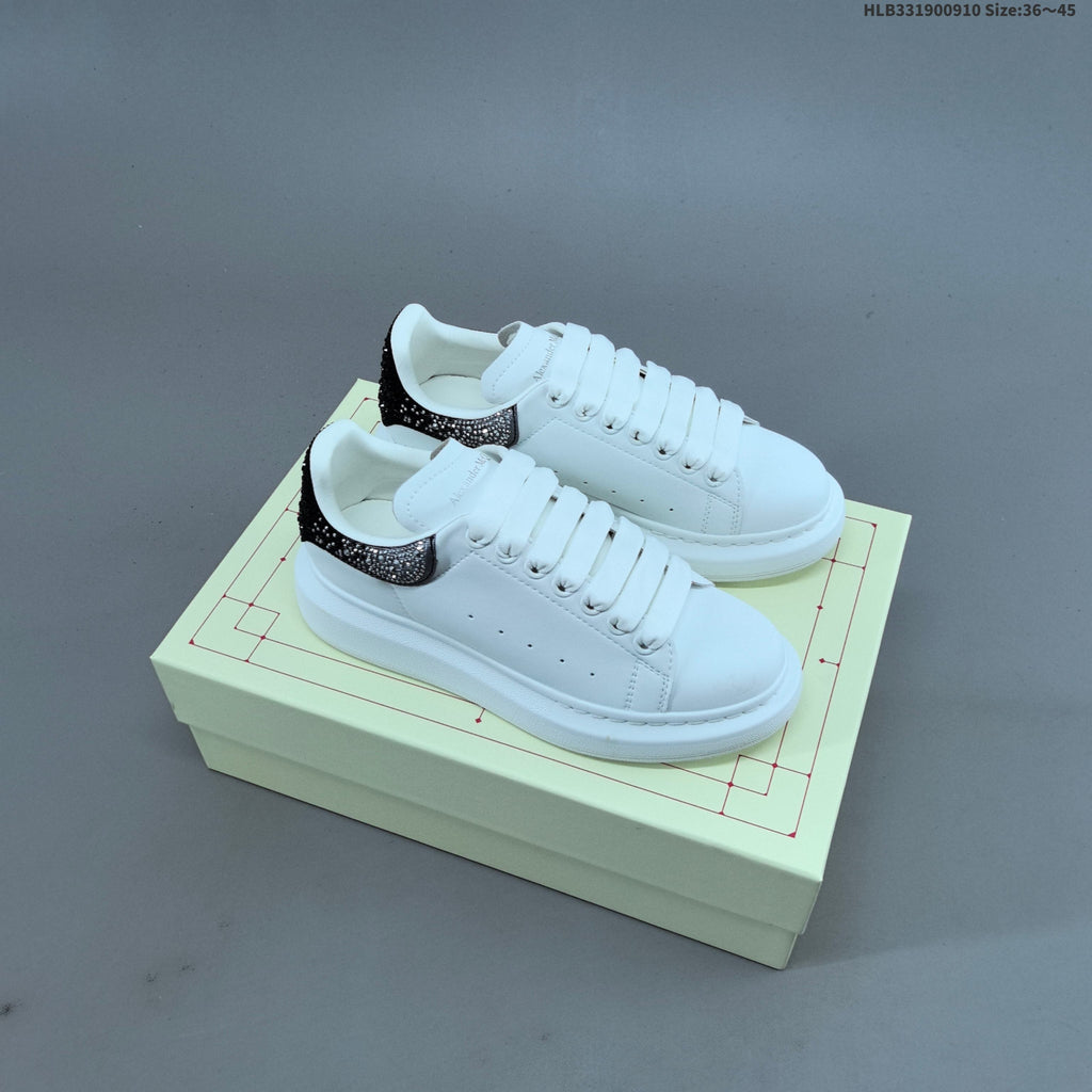 Alexander McQueen Oversized Low-Cut Sneakers with Crystal Heel - product image from the listing.