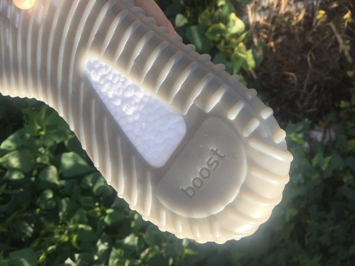Yeezy 350 V2 Sneakers in Gray and Orange Knit - product image from the listing.