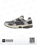 Nike Air Zoom Vomero 5 Running Shoes, in Gray and Black - product image from the listing.