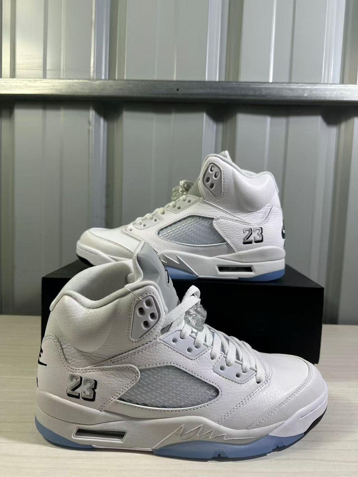 Air Jordan 5 Sneakers in White Silver HQ7978-103 - product image from the listing.