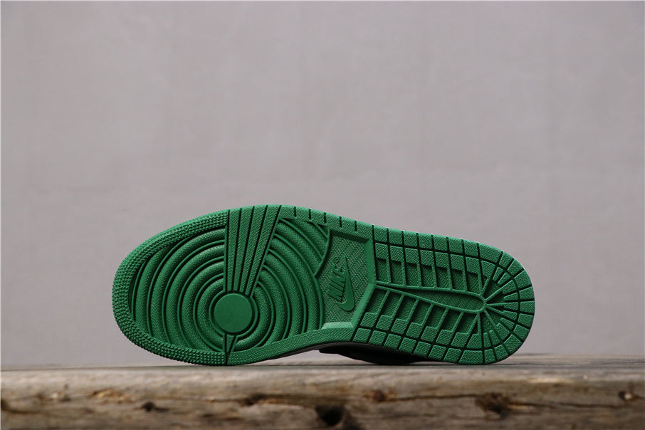 Jordan 1 Low Sneakers in Black Green 553558-113 - product image from the listing.