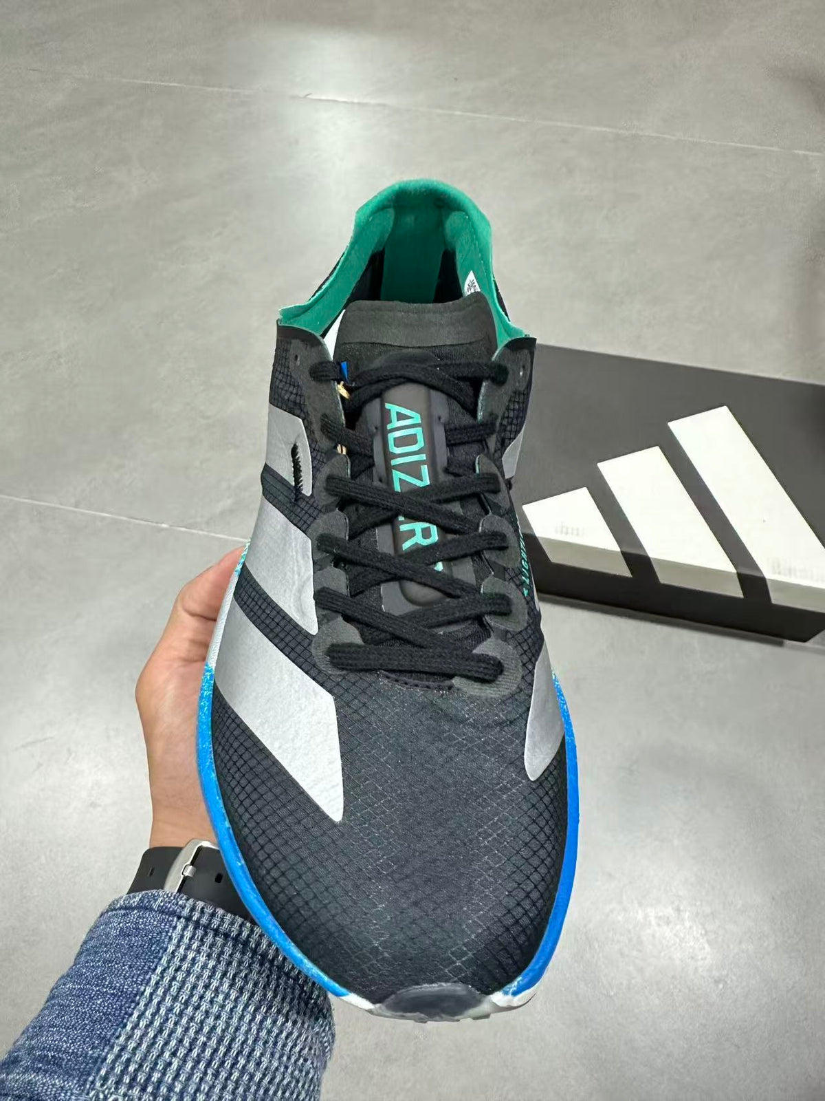 Nike Adizero Lightstrike Pro Running Shoes in Black Blue - product image from the listing.
