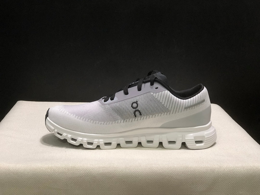On Cloud 6 Push Sneakers in White Grey Black - product image from the listing.