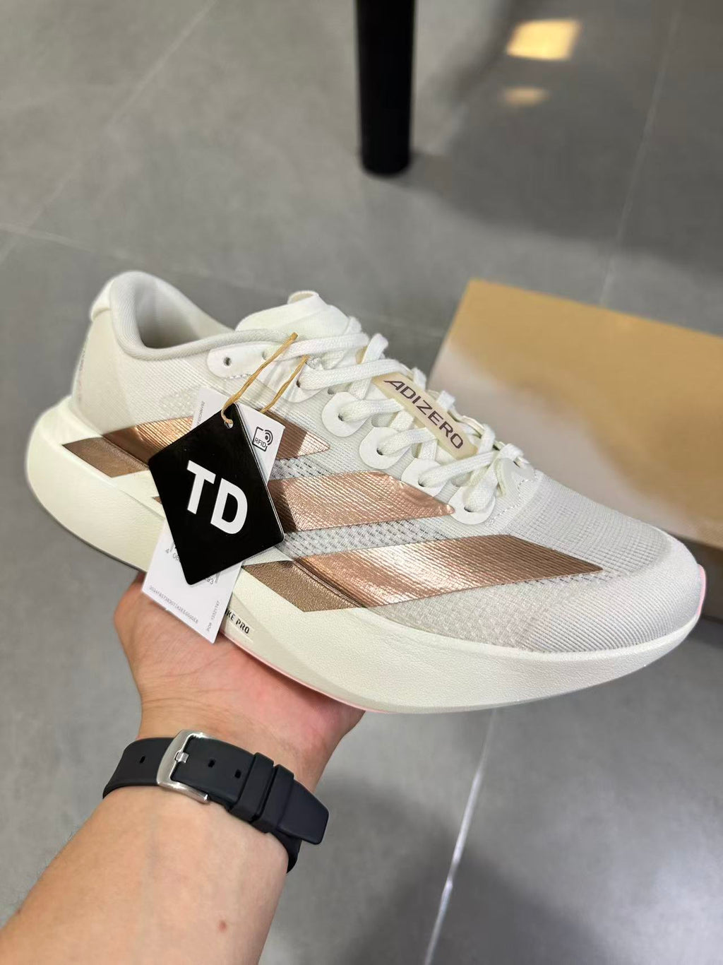 Adidas Adizero Lightstrike Pro White Champagne Shoes for Running - product image from the listing.