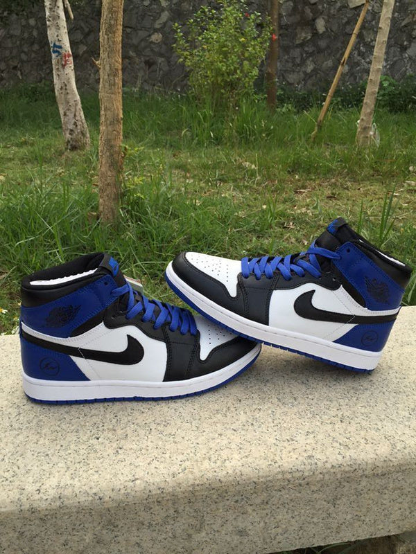 Jordan 1 High Sneakers in Black, in White and Royal Blue - product image from the listing.