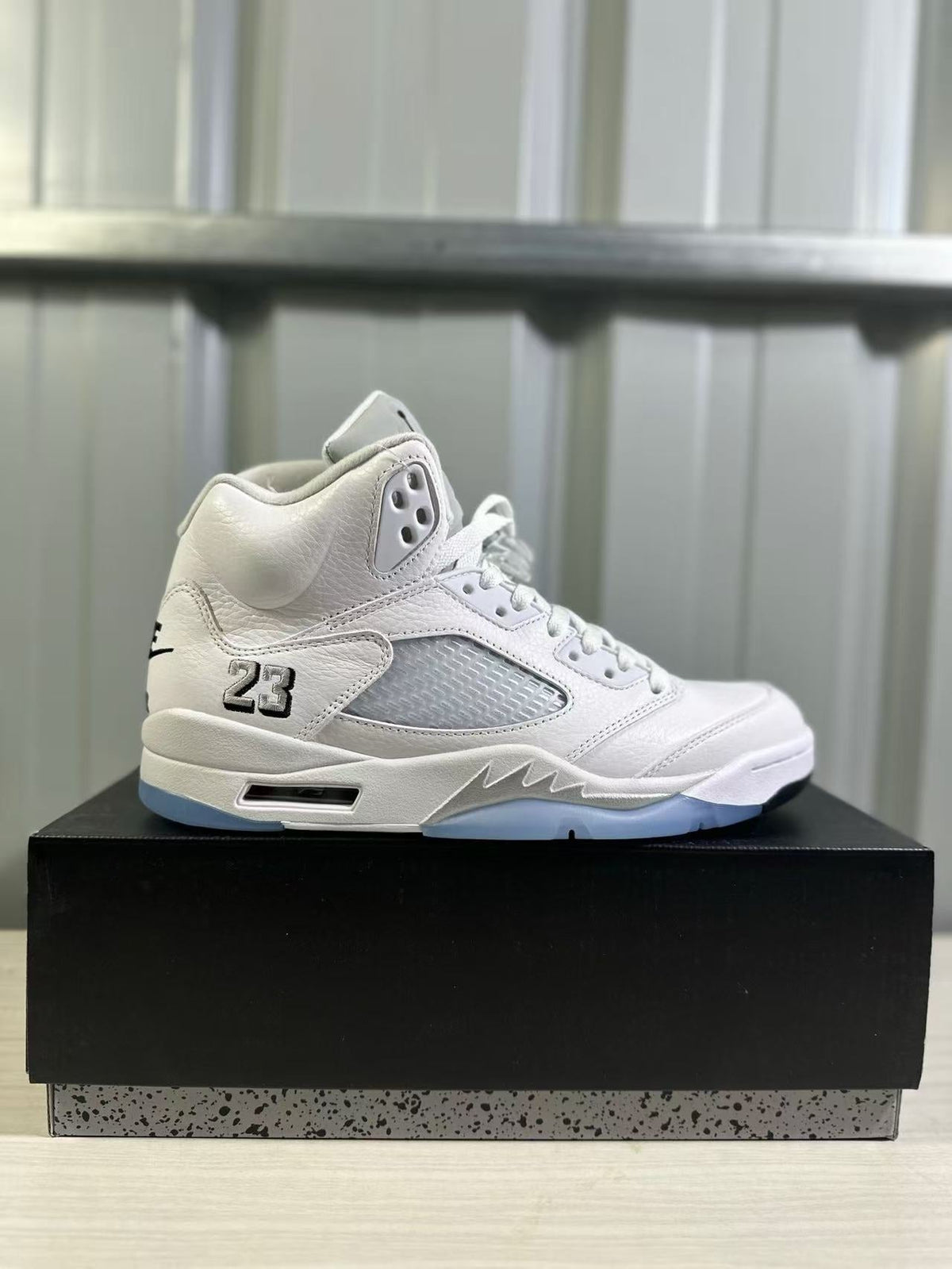Air Jordan 5 Sneakers in White Silver HQ7978-103 - product image from the listing.