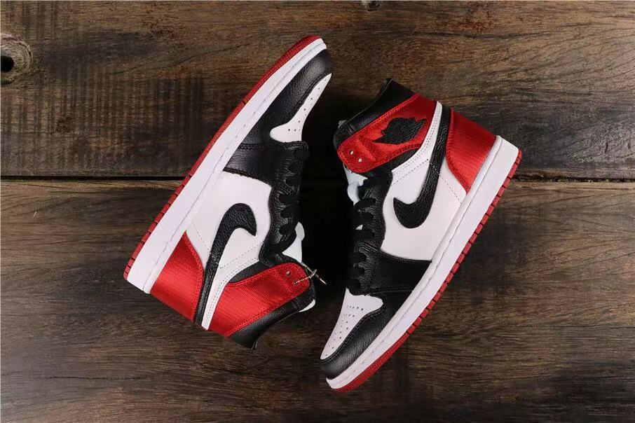 Air Jordan 1 Satin Black Toe High-Cut Sneakers - product image from the listing.
