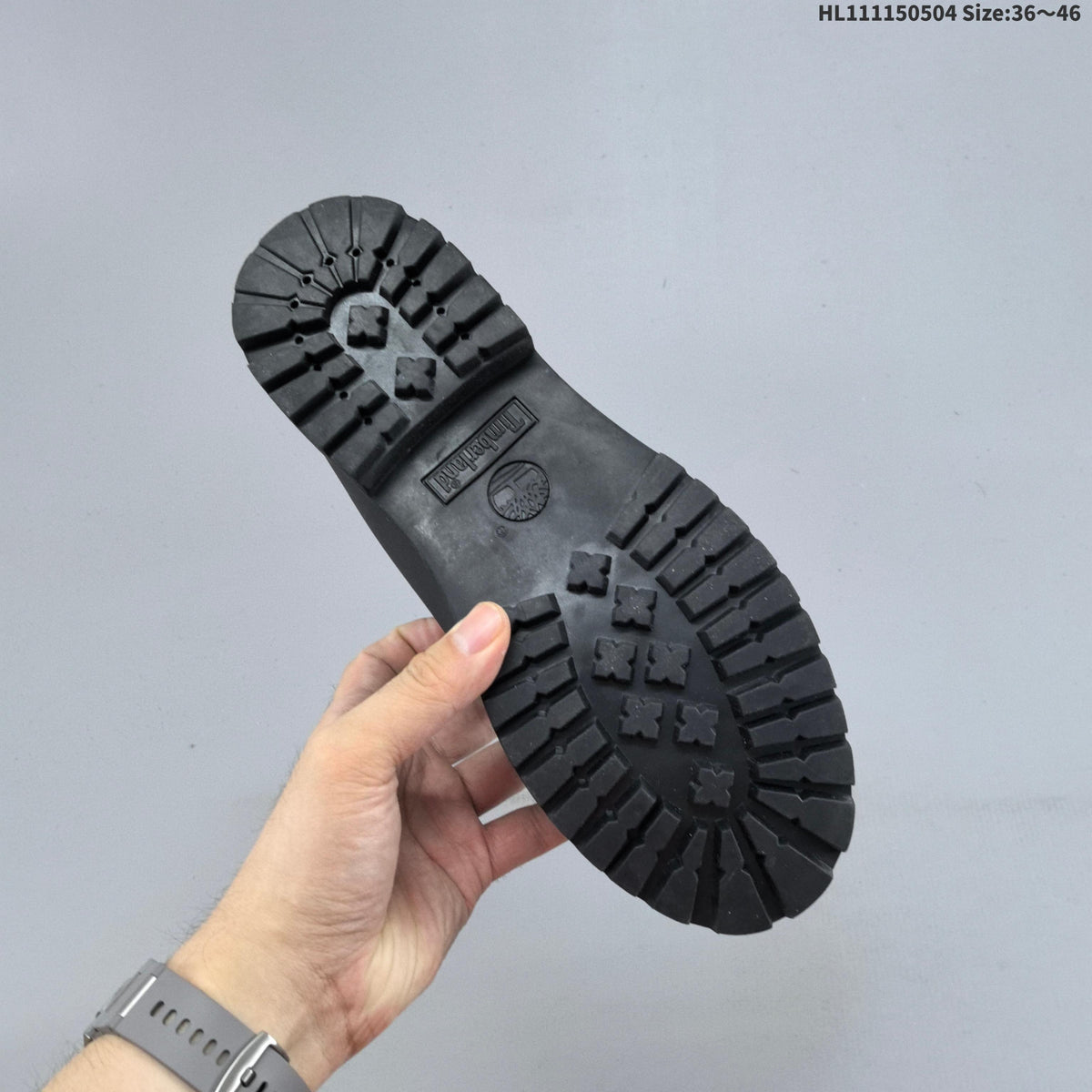 Black 6-Inch Lace-Up Boots by Timberland - product image from the listing.
