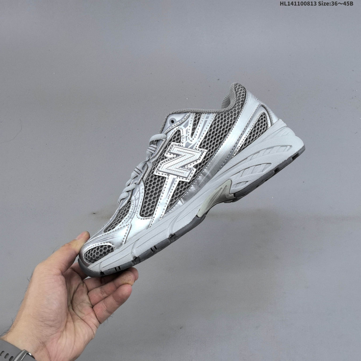 Grey and Silver New Balance 740 Sneakers CR740MG - product image from the listing.