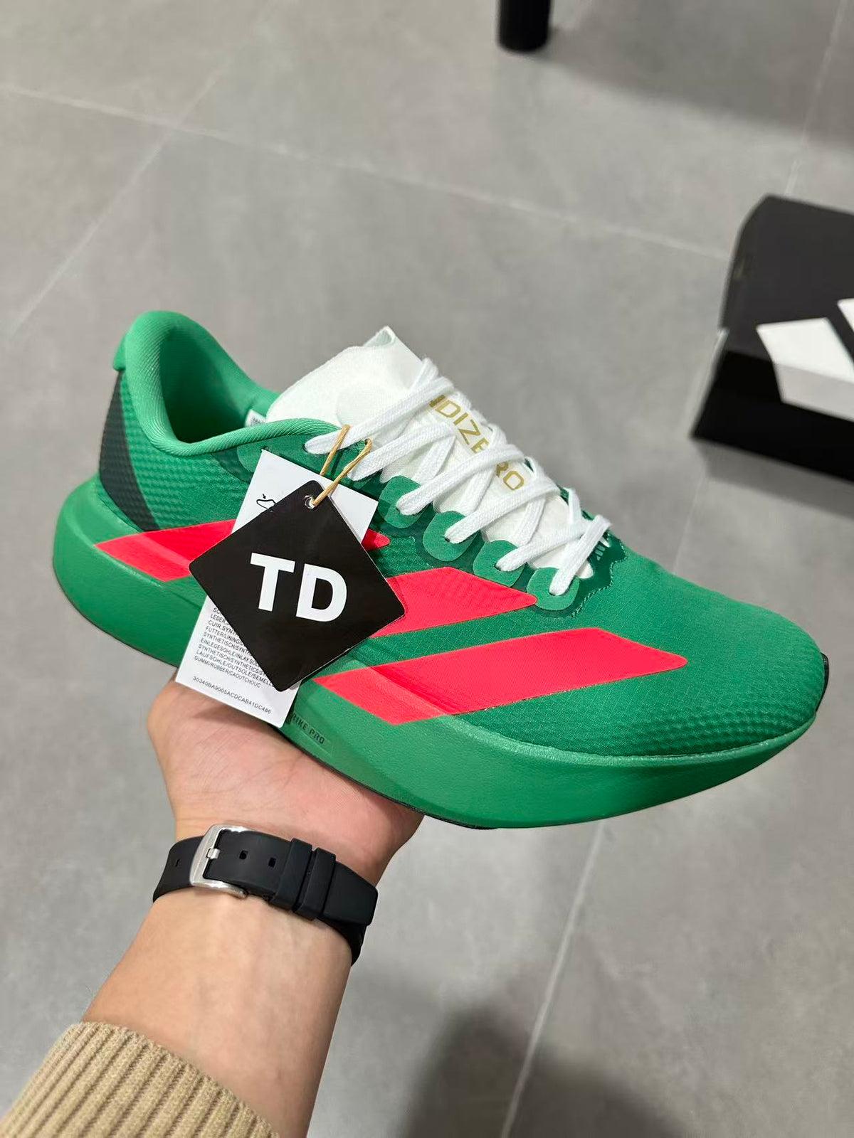 Adidas Lightstrike Pro Running Shoes in Green Red JQ4440 - product image from the listing.