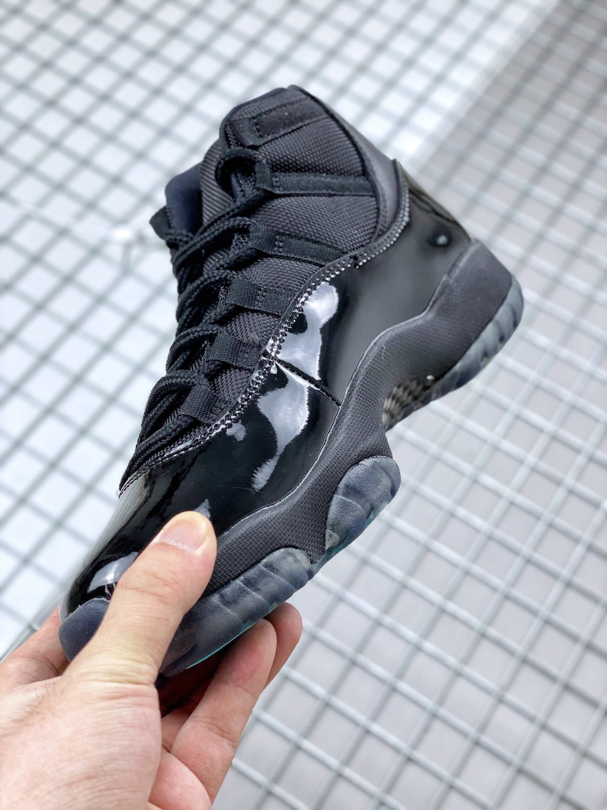 Air Jordan 11 Retro Gamma Black Sneakers 378037-006 - product image from the listing.