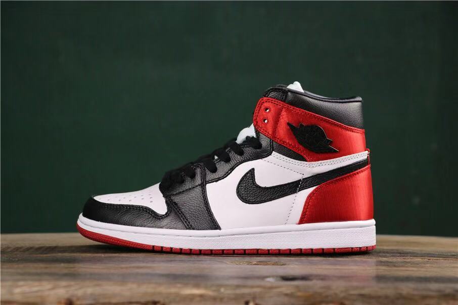 Air Jordan 1 Satin Black Toe High-Cut Sneakers - product image from the listing.