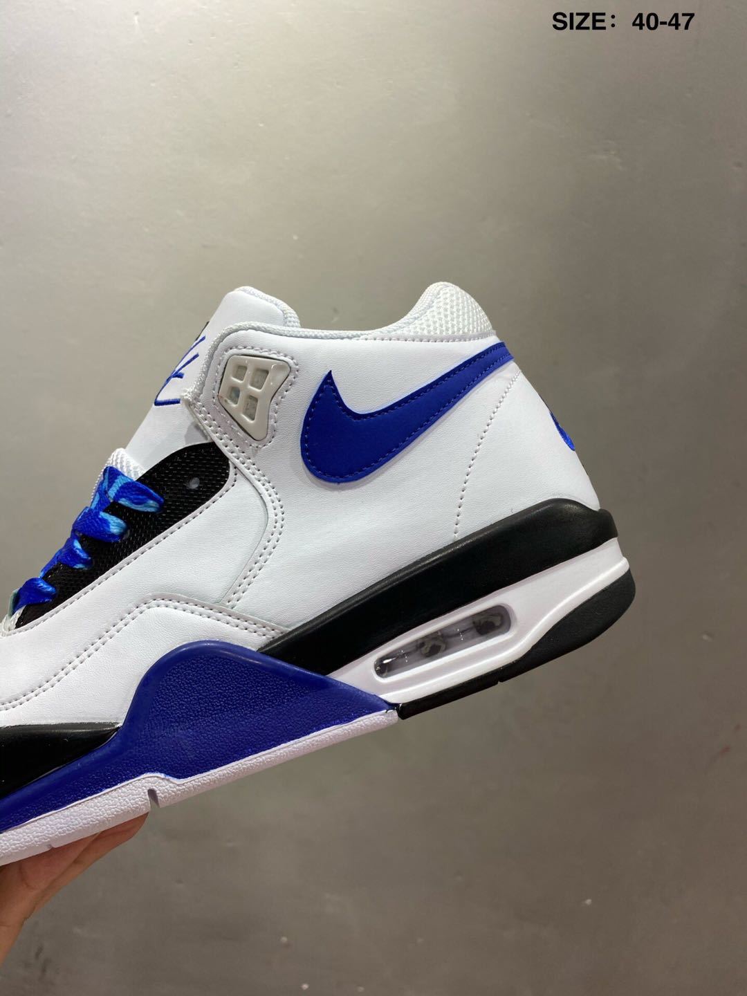 Nike Air Flight 89 Sneakers in White and Royal Blue - product image from the listing.