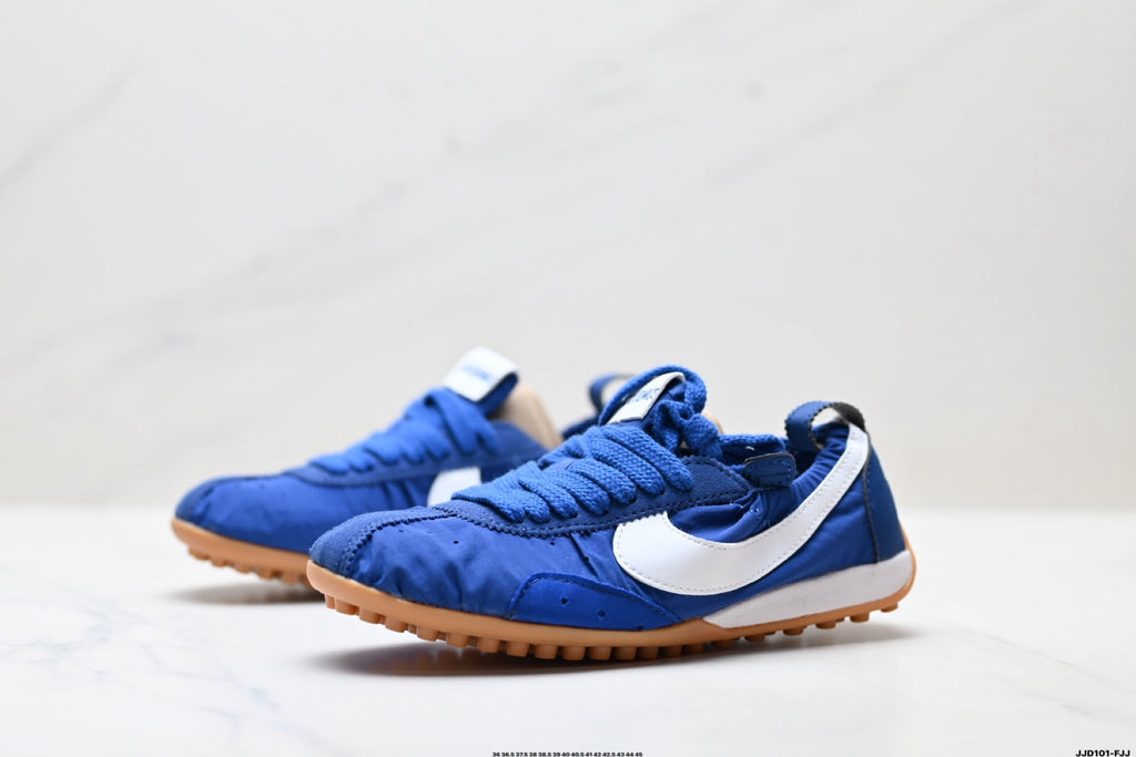 Jacquemus x Nike Jacumoon Low-Top Sneakers, in Blue and White - product image from the listing.