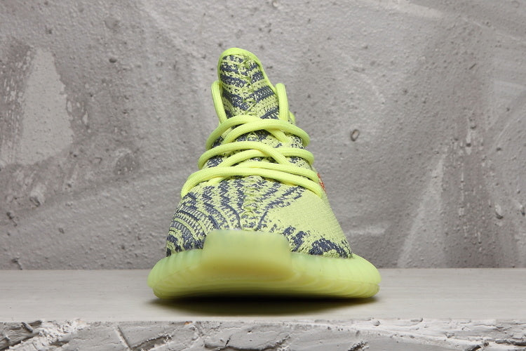 Lime Green and Charcoal Yeezy Boost 350 V2 Sneakers - product image from the listing.